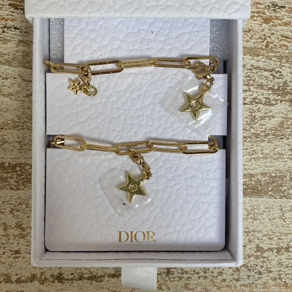 Dior gold phone charm NEW with box